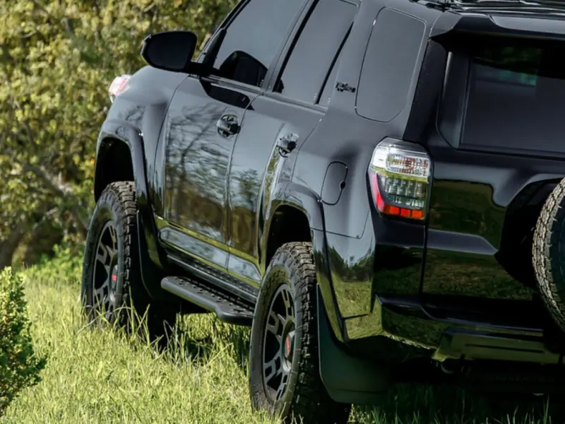 Cali Raised 10-24 Toyota 4Runner Step Ed Bolt On Rock Sliders - Kick Out/Bedliner Filler Plate/Pwdr 1